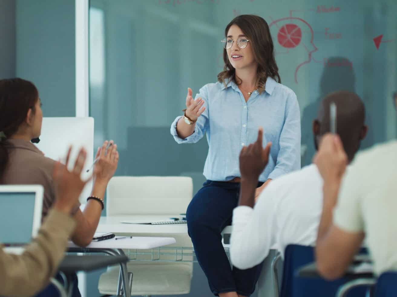 female teacher in classroom with students